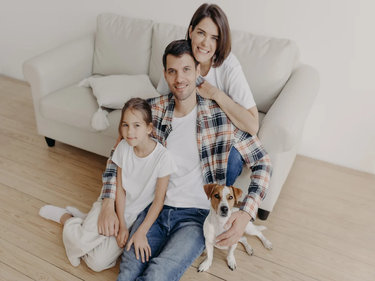 Multigenerational family relaxing together in their South Florida home